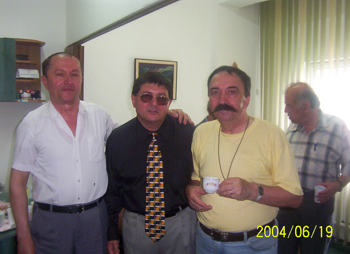 With writers Ion Soare and Doru Motoc, Rm. Valcea and Costea Marinoiu, 2004.jpg